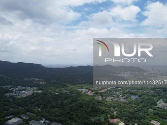 Winds and clouds are rising above the West Lake affected by Typhoon Kaemi in Hangzhou, China, on July 25, 2024. (