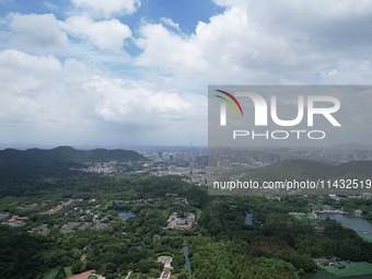 Winds and clouds are rising above the West Lake affected by Typhoon Kaemi in Hangzhou, China, on July 25, 2024. (