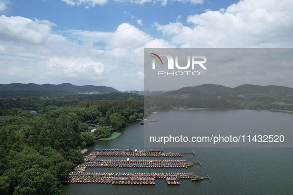 Winds and clouds are rising above the West Lake affected by Typhoon Kaemi in Hangzhou, China, on July 25, 2024. 