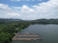 Winds and clouds are rising above the West Lake affected by Typhoon Kaemi in Hangzhou, China, on July 25, 2024. (