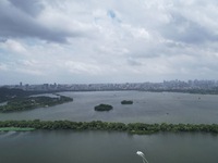 Winds and clouds are rising above the West Lake affected by Typhoon Kaemi in Hangzhou, China, on July 25, 2024. (