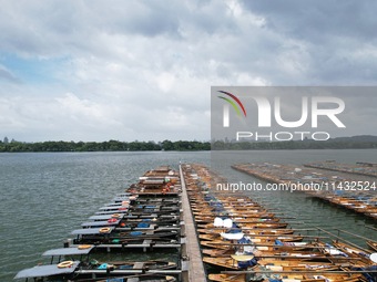 Winds and clouds are rising above the West Lake affected by Typhoon Kaemi in Hangzhou, China, on July 25, 2024. (