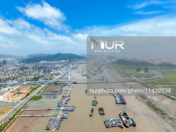 Boats are taking shelter from Typhoon Kaemi at Shenjiamen Fishing Port in Putuo district of Zhoushan city, East China's Zhejiang province, i...