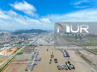 Boats are taking shelter from Typhoon Kaemi at Shenjiamen Fishing Port in Putuo district of Zhoushan city, East China's Zhejiang province, i...