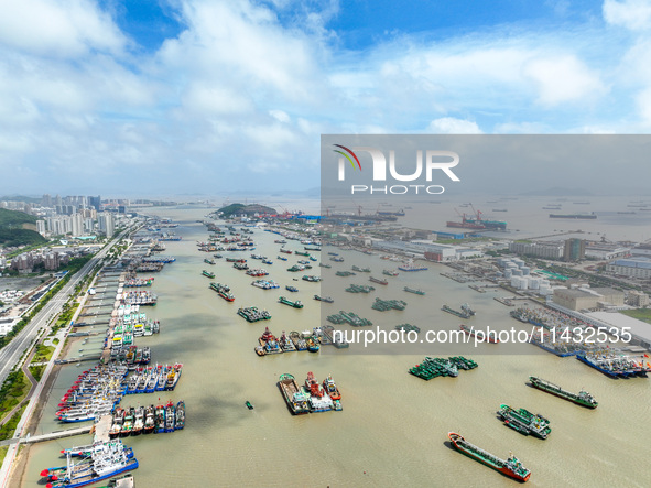 Boats are taking shelter from Typhoon Kaemi at Shenjiamen Fishing Port in Putuo district of Zhoushan city, East China's Zhejiang province, i...