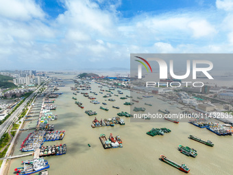 Boats are taking shelter from Typhoon Kaemi at Shenjiamen Fishing Port in Putuo district of Zhoushan city, East China's Zhejiang province, i...