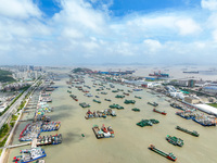 Boats are taking shelter from Typhoon Kaemi at Shenjiamen Fishing Port in Putuo district of Zhoushan city, East China's Zhejiang province, i...