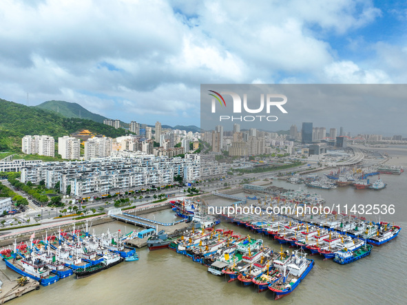 Boats are taking shelter from Typhoon Kaemi at Shenjiamen Fishing Port in Putuo district of Zhoushan city, East China's Zhejiang province, i...