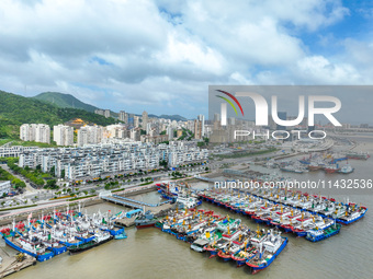 Boats are taking shelter from Typhoon Kaemi at Shenjiamen Fishing Port in Putuo district of Zhoushan city, East China's Zhejiang province, i...