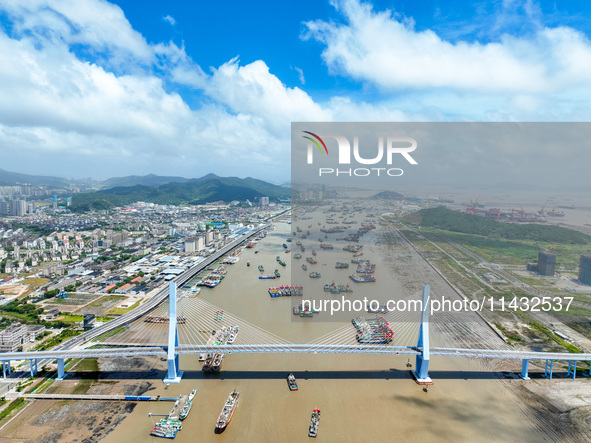 Boats are taking shelter from Typhoon Kaemi at Shenjiamen Fishing Port in Putuo district of Zhoushan city, East China's Zhejiang province, i...