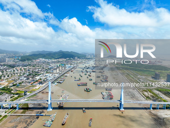 Boats are taking shelter from Typhoon Kaemi at Shenjiamen Fishing Port in Putuo district of Zhoushan city, East China's Zhejiang province, i...