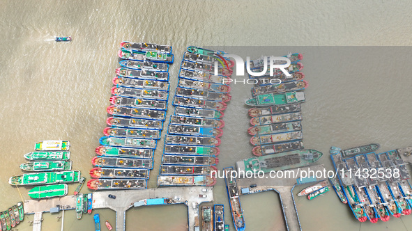 Boats are taking shelter from Typhoon Kaemi at Shenjiamen Fishing Port in Putuo district of Zhoushan city, East China's Zhejiang province, i...