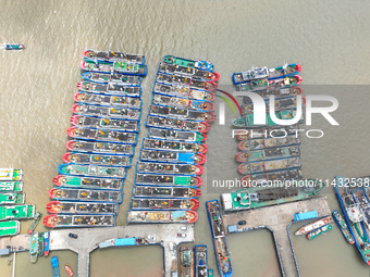 Boats are taking shelter from Typhoon Kaemi at Shenjiamen Fishing Port in Putuo district of Zhoushan city, East China's Zhejiang province, i...