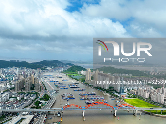 Boats are taking shelter from Typhoon Kaemi at Shenjiamen Fishing Port in Putuo district of Zhoushan city, East China's Zhejiang province, i...