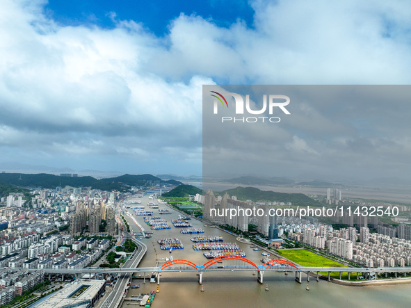 Boats are taking shelter from Typhoon Kaemi at Shenjiamen Fishing Port in Putuo district of Zhoushan city, East China's Zhejiang province, i...