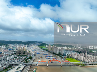 Boats are taking shelter from Typhoon Kaemi at Shenjiamen Fishing Port in Putuo district of Zhoushan city, East China's Zhejiang province, i...