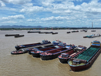 Cargo ships are anchoring in the waters of the Nanjing section of the Yangtze River in Nanjing, Jiangsu province, China, on July 25, 2024. O...