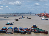 Cargo ships are anchoring in the waters of the Nanjing section of the Yangtze River in Nanjing, Jiangsu province, China, on July 25, 2024. O...