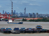 Cargo ships are anchoring in the waters of the Nanjing section of the Yangtze River in Nanjing, Jiangsu province, China, on July 25, 2024. O...