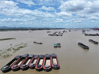 Cargo ships are anchoring in the waters of the Nanjing section of the Yangtze River in Nanjing, Jiangsu province, China, on July 25, 2024. O...