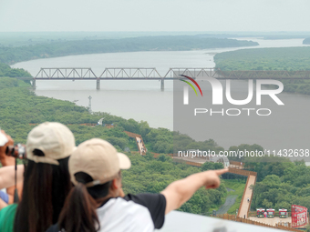 View of the Russia-North Korea railway bridge and the estuary of the Tumen River in Hunchun city, Yanbian prefecture, Jilin province, in Yan...