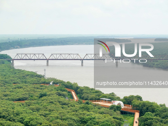 View of the Russia-North Korea railway bridge and the estuary of the Tumen River in Hunchun city, Yanbian prefecture, Jilin province, in Yan...