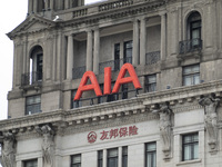 The AIA Building on the Bund in the Huangpu district of Shanghai, China, on July 25, 2024, is standing prominently. (