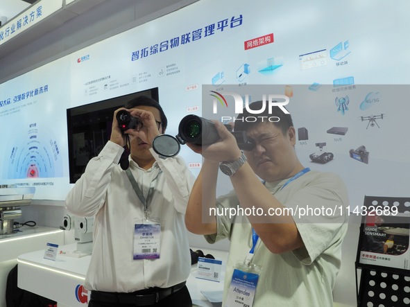 Visitors are experiencing the ''infrared Telescope'' at the ''Fifth World Photon Congress 2024'' in Beijing, China, on July 25, 2024. 