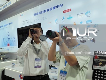 Visitors are experiencing the ''infrared Telescope'' at the ''Fifth World Photon Congress 2024'' in Beijing, China, on July 25, 2024. (