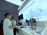 Visitors are visiting the ''Explosion-proof thermal imaging three-eye head'' at the ''Fifth World Photonics Congress 2024'' in Beijing, Chin...