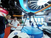 Visitors are visiting a ''drone Borne hyperspectral Imager'' at the ''Fifth World Photonics Congress 2024'' in Beijing, China, on July 25, 2...