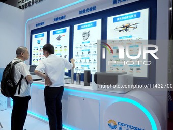 Visitors are visiting the ''Spectrometer'' at the ''Fifth World Photon Congress 2024'' in Beijing, China, on July 25, 2024. (