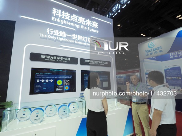 Visitors are visiting ''Special Optical fibers'' at the ''Fifth World Photonics Congress 2024'' in Beijing, China, on July 25, 2024. 