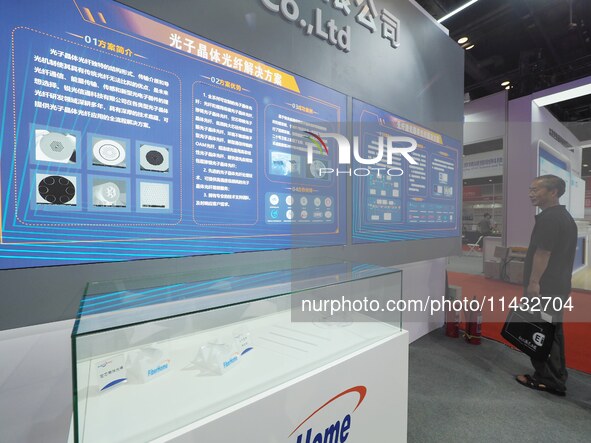 Visitors are visiting ''Fiber Solutions for Fiber Lasers'' at the ''Fifth World Photonics Congress 2024'' in Beijing, China, on July 25, 202...