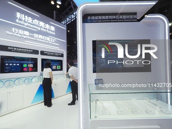 Visitors are visiting ''Special Optical fibers'' at the ''Fifth World Photonics Congress 2024'' in Beijing, China, on July 25, 2024. (