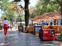 A diesel generator is being used as a backup during power outages by a cafe terrace in Odesa, Ukraine, on July 23, 2024. NO USE RUSSIA. NO U...