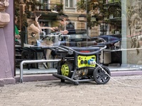 A diesel generator is being used as a backup during power outages outside a beauty salon in Odesa, Ukraine, on July 24, 2024. NO USE RUSSIA....