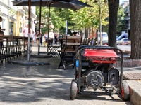 A diesel generator is being used as a backup during power outages in the street in Odesa, Ukraine, on July 23, 2024. NO USE RUSSIA. NO USE B...