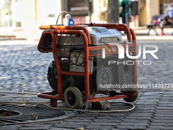 A diesel generator is being used as a backup during power outages in the street in Odesa, Ukraine, on July 23, 2024. NO USE RUSSIA. NO USE B...