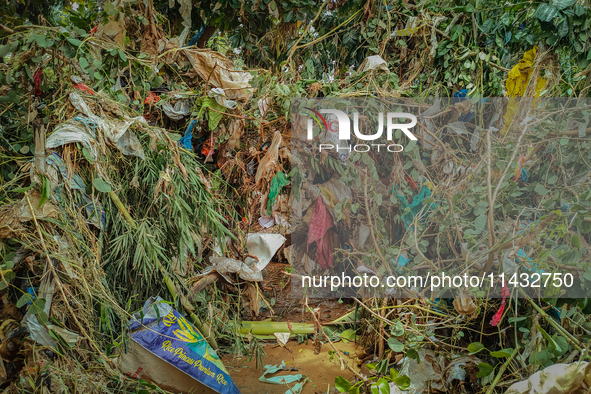 Plastic wastes are being left beside the river in Marikina City, Philippines, on July 25, 2024, after the massive flood in Metro Manila due...