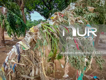 Plastic wastes are being left beside the river in Marikina City, Philippines, on July 25, 2024, after the massive flood in Metro Manila due...