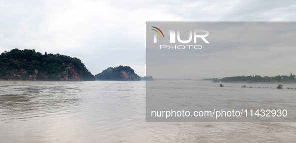 Tourists are visiting the Leshan Giant Buddha scenic spot in Leshan, China, on July 25, 2024. 