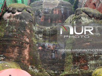 Tourists are visiting the Leshan Giant Buddha scenic spot in Leshan, China, on July 25, 2024. (