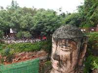 Tourists are visiting the Leshan Giant Buddha scenic spot in Leshan, China, on July 25, 2024. (