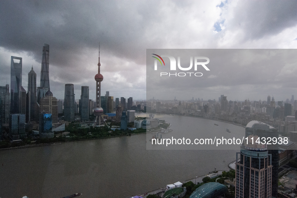 Dark clouds are forming above the Huangpu River in Shanghai, China, on July 25, 2024, as Typhoon Gaemi is heading toward China 