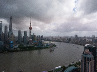 Dark clouds are forming above the Huangpu River in Shanghai, China, on July 25, 2024, as Typhoon Gaemi is heading toward China (