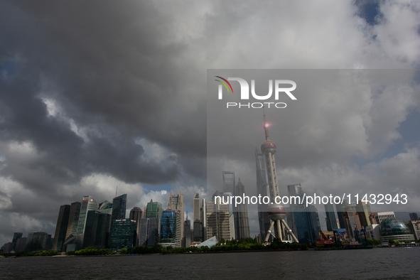 Dark clouds are forming above the Huangpu River in Shanghai, China, on July 25, 2024, as Typhoon Gaemi is heading toward China 