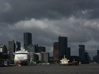 Dark clouds are forming above the Huangpu River in Shanghai, China, on July 25, 2024, as Typhoon Gaemi is heading toward China (