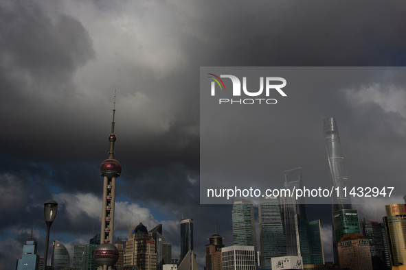 Dark clouds are forming above the Huangpu River in Shanghai, China, on July 25, 2024, as Typhoon Gaemi is heading toward China 