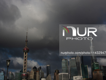 Dark clouds are forming above the Huangpu River in Shanghai, China, on July 25, 2024, as Typhoon Gaemi is heading toward China (